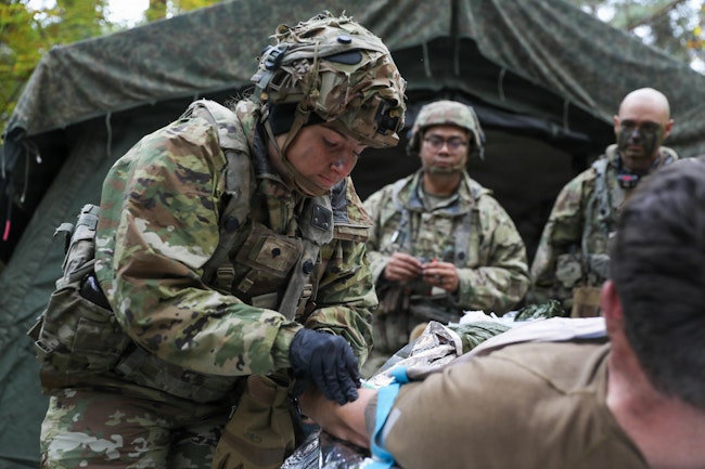 An Army medic practices tactical combat casualty care (TCCC) and a blood transfusion at Hohenfels, Germany, earlier this month.