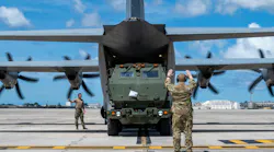 A U.S. Air Force instructor loadmaster guides a U.S. Marine Corps High Mobility Artillery Rocket System into a C-130J Super Hercules. Modern test equipment enables technology to be serviced while deployed rather than being sent back to the home front. Air Force photo