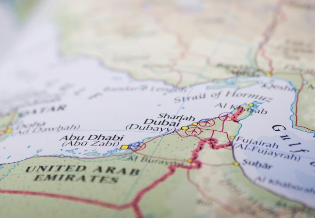 A photo of Abu Dhabi on a map