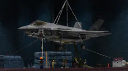 Technicians from the Air Force 412th Electronic Warfare Group position an F-35A combat jet in the Benefield Anechoic Facility at Edwards Air Force Base last May. Air Force photo