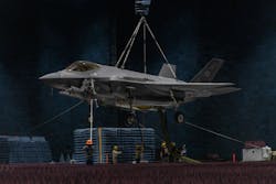 Technicians from the Air Force 412th Electronic Warfare Group position an F-35A combat jet in the Benefield Anechoic Facility at Edwards Air Force Base last May. Air Force photo Technicians from the Air Force 412th Electronic Warfare Group position an F-35A combat jet in the Benefield Anechoic Facility at Edwards Air Force Base last May. Air Force photo