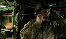 A U.S. Army combat medic relays commands to the driver of an Armored Multi-Purpose Vehicles (AMPV) at Fort Stewart, Ga., in May 2024.