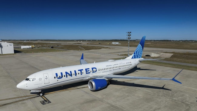 The 2025 Boeing ecoDemonstrator Explorer, a United Airlines 737-8, sits outside a United hangar in Houston before its first flight to test Internet Protocol Suit.