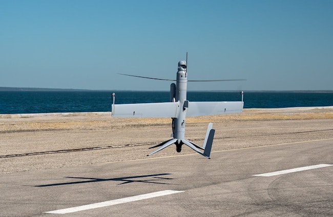 Airbus' Flexrotor vtol hovers over tarmac.