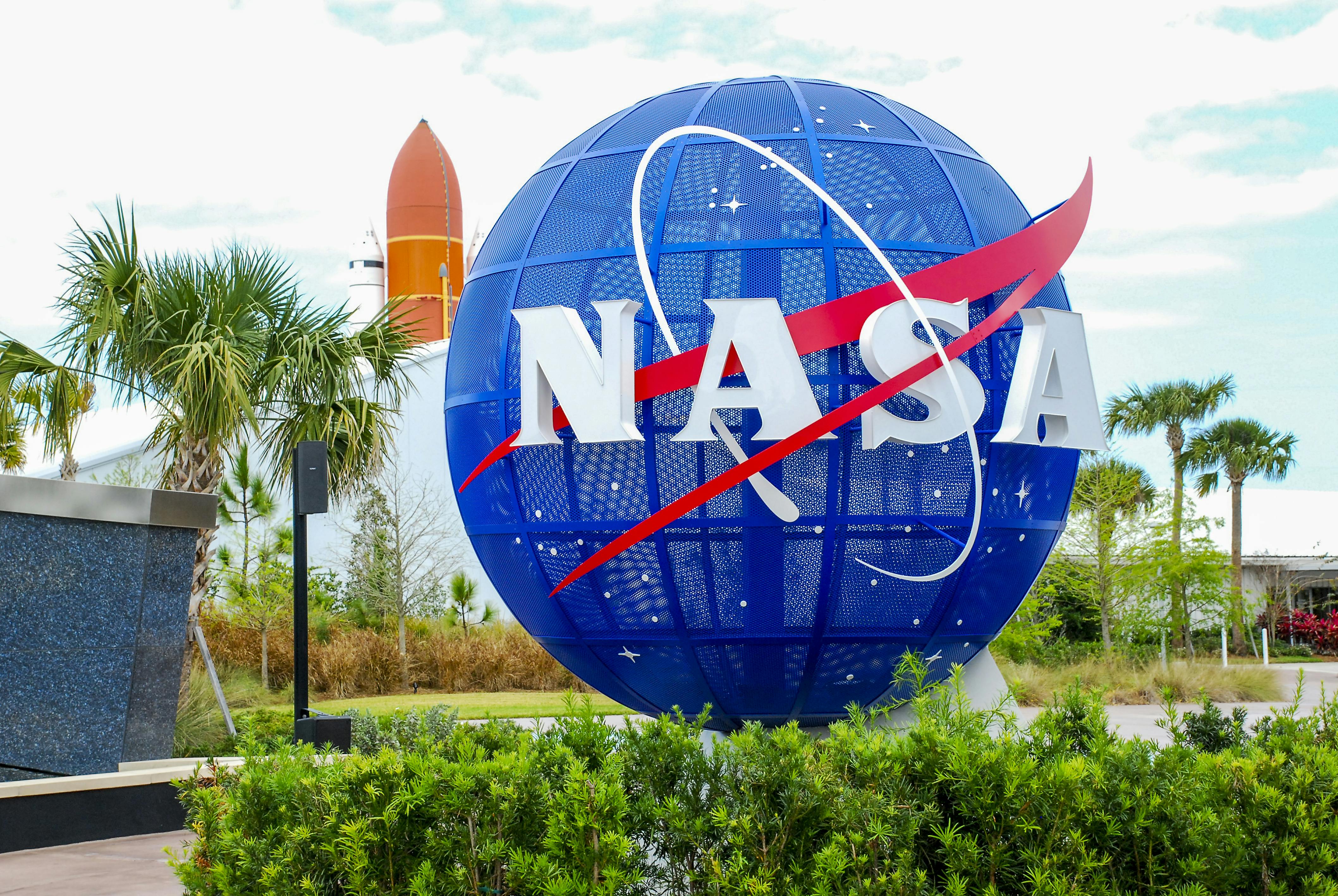 NASA logo globe at the entrance to the Kennedy Space Center Visitor Center, Cape Canaveral, Florida.