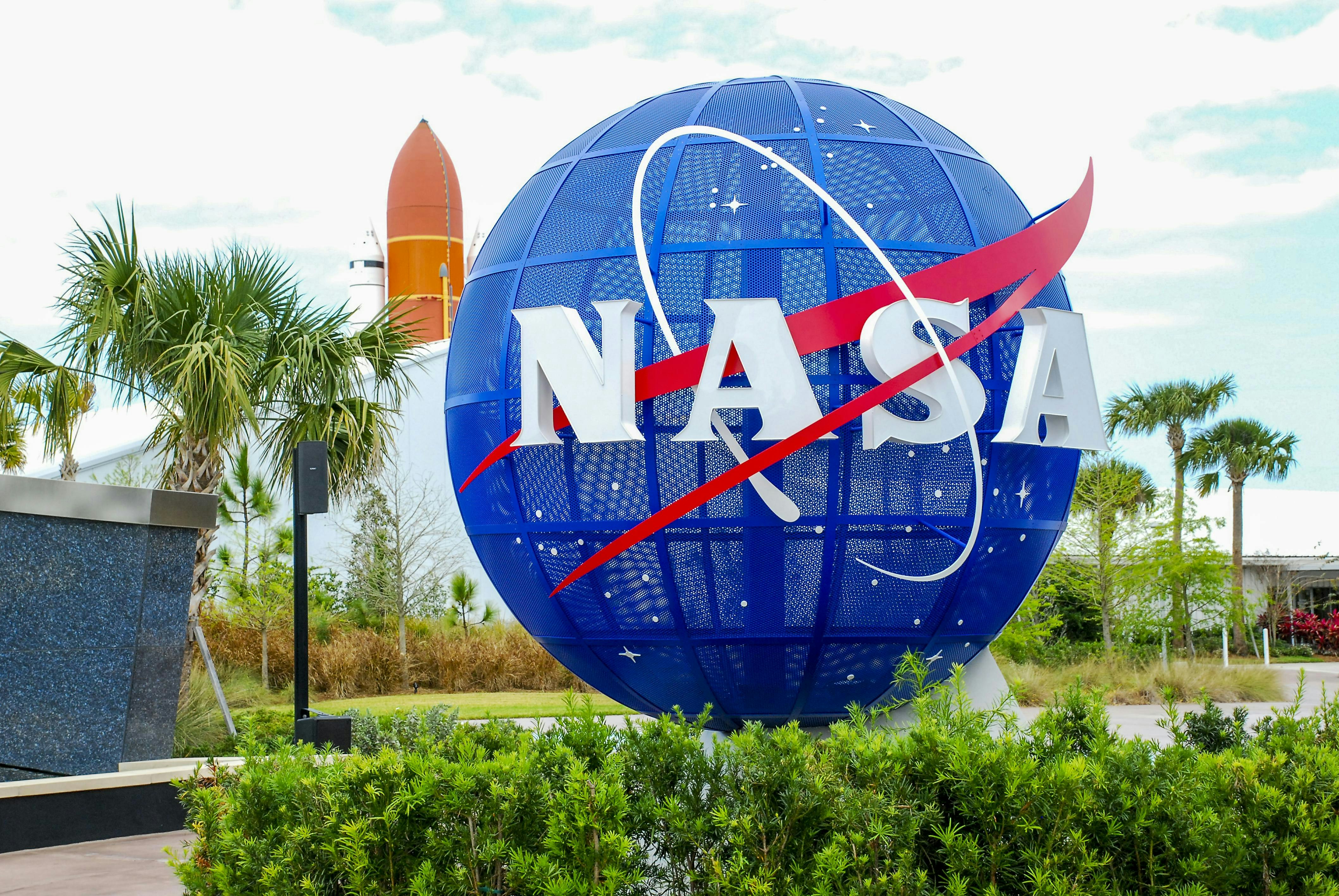NASA logo globe at the entrance to the Kennedy Space Center Visitor Center, Cape Canaveral, Florida.