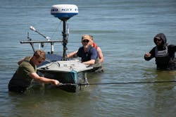 Naval personnel retrieve the unmanned surface vessel named Lightfish after it completed the fastest known transatlantic crossing of a USV in September 2025. Navy photo Naval personnel retrieve the unmanned surface vessel named Lightfish after it completed the fastest known transatlantic crossing of a USV in September 2025. Navy photo