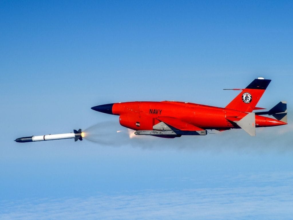 A BQM-34 unmanned aerial target, which is remotely piloted during flight, releases a test missile over the Point Mugu Sea Range to improve range and targeting for future Navy missions.