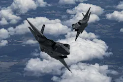 Two U.S. Air Force F-35A Lightning II aircraft fly in formation on the way to perform at the Air and Sea Air Show in Miami in May 2024.