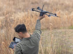 A U.S. Marine prepares a Skydio X2D small unmanned aircraft system during a gunnery qualification range on Marine Corps Base Camp Lejeune, N.C., last month. A U.S. Marine prepares a Skydio X2D small unmanned aircraft system during a gunnery qualification range on Marine Corps Base Camp Lejeune, N.C., last month.