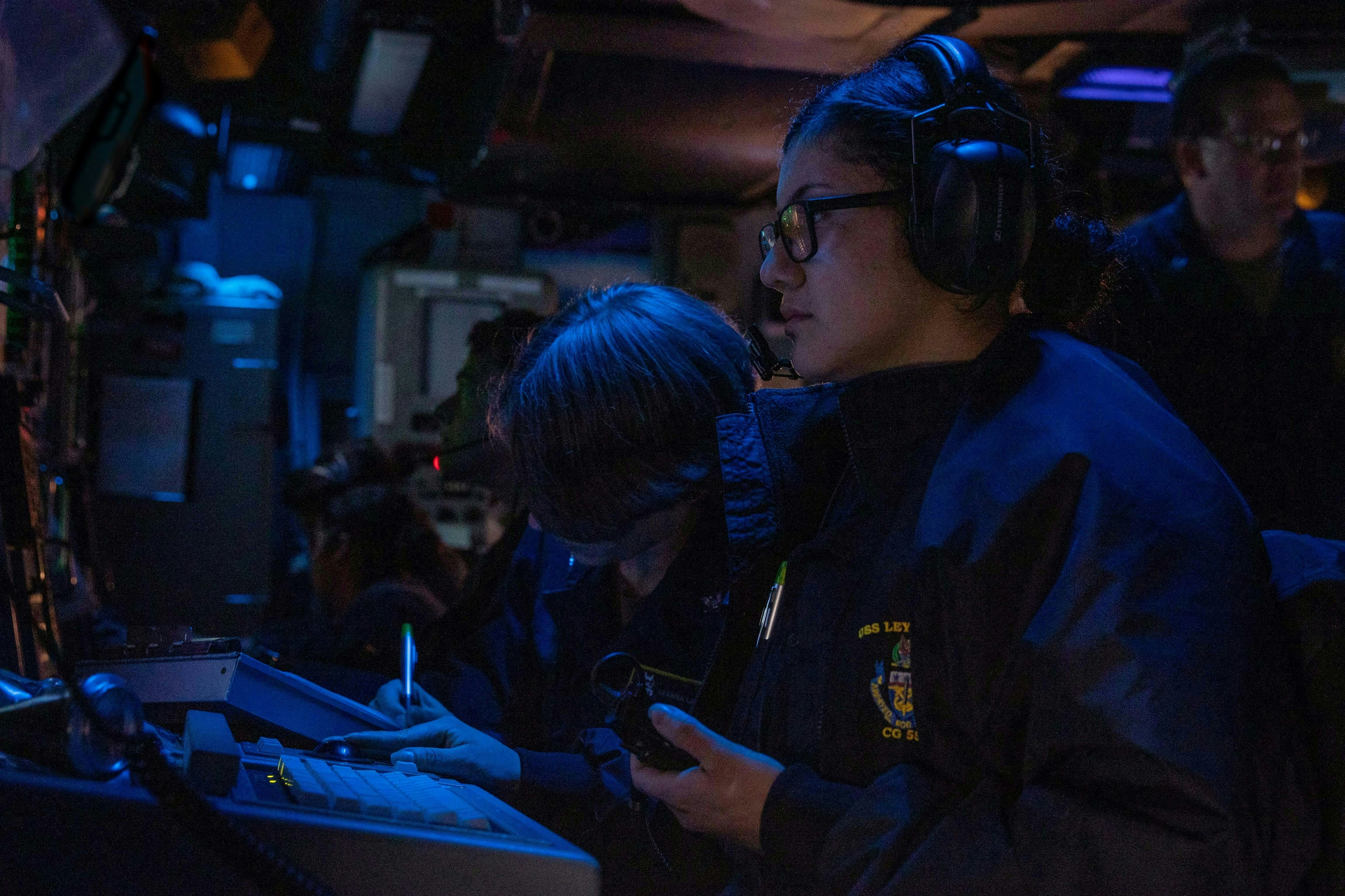 A Navy surface sonar technician stands sonar watch aboard the Ticonderoga-class guided-missile cruiser USS Leyte Gulf (CG 55) in 2022.