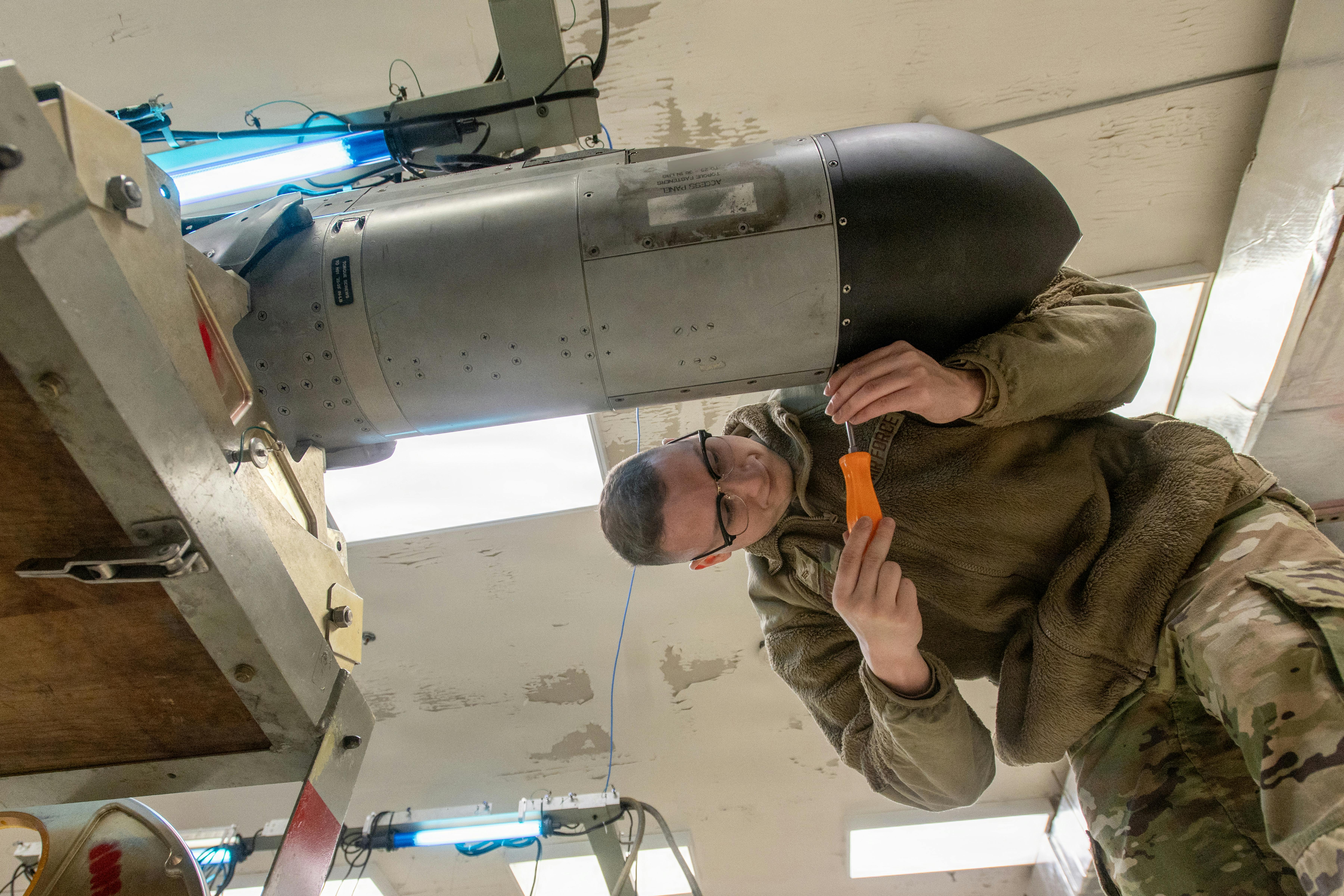 A U.S. Air Force electronic warfare technician inspects an electronic countermeasure pod at McEntire Joint National Guard Base, S.C., last November.