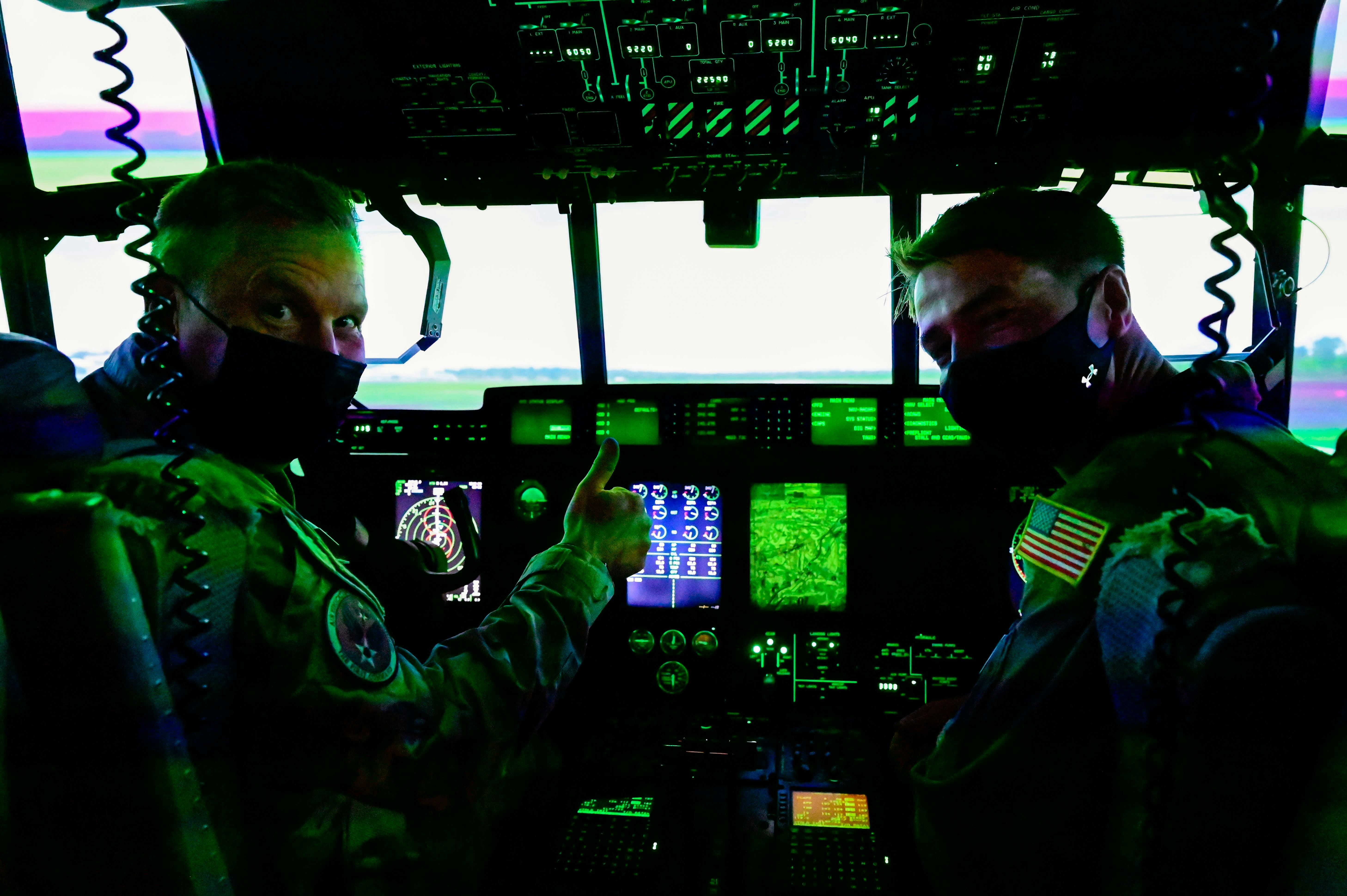 Air crew operate a JMATS simulator at Little Rock Air Force Base, Ark., in 2021.