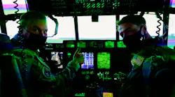 Air crew operate a JMATS simulator at Little Rock Air Force Base, Ark., in 2021.
