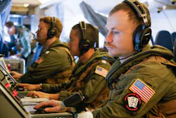 Navy P-8A crew members operate at mission control workstations during the Cutlass Express 2026 exercise last month.
