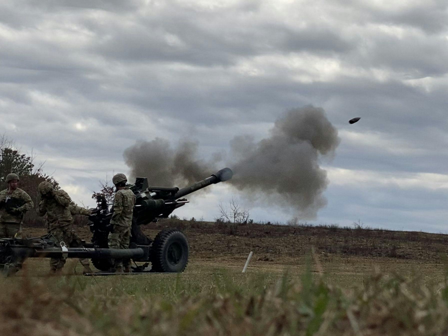 U.S. soldiers fire an M777 towed 155-millimeter howitzer artillery system at Fort Indiantown Gap, Pa., in 2023.