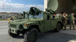 U.S. Marines operate a Secure, Mobile, Anti-jam, Reliable, Tactical-Terminal, a type of mobile satellite terminal, to establish point to point communication at Camp Hansen, Okinawa, Japan, last January.