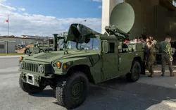 U.S. Marines operate a Secure, Mobile, Anti-jam, Reliable, Tactical-Terminal, a type of mobile satellite terminal, to establish point to point communication at Camp Hansen, Okinawa, Japan, last January.