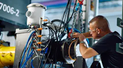 An expert conducts SWITCH powertrain testing at the Collins Aerospace facility known as 'The Grid' in Rockford, Ill. Collins Aerospace/RTX photo.