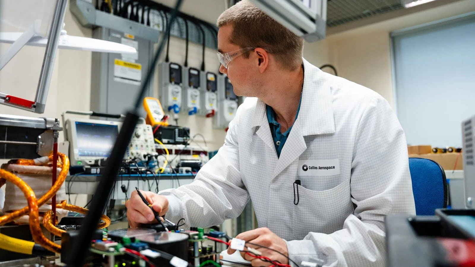 A Collins Aerospace engineer tests power conversion units for HECATE at Solihull. Collins Aerospace/RTX photo.