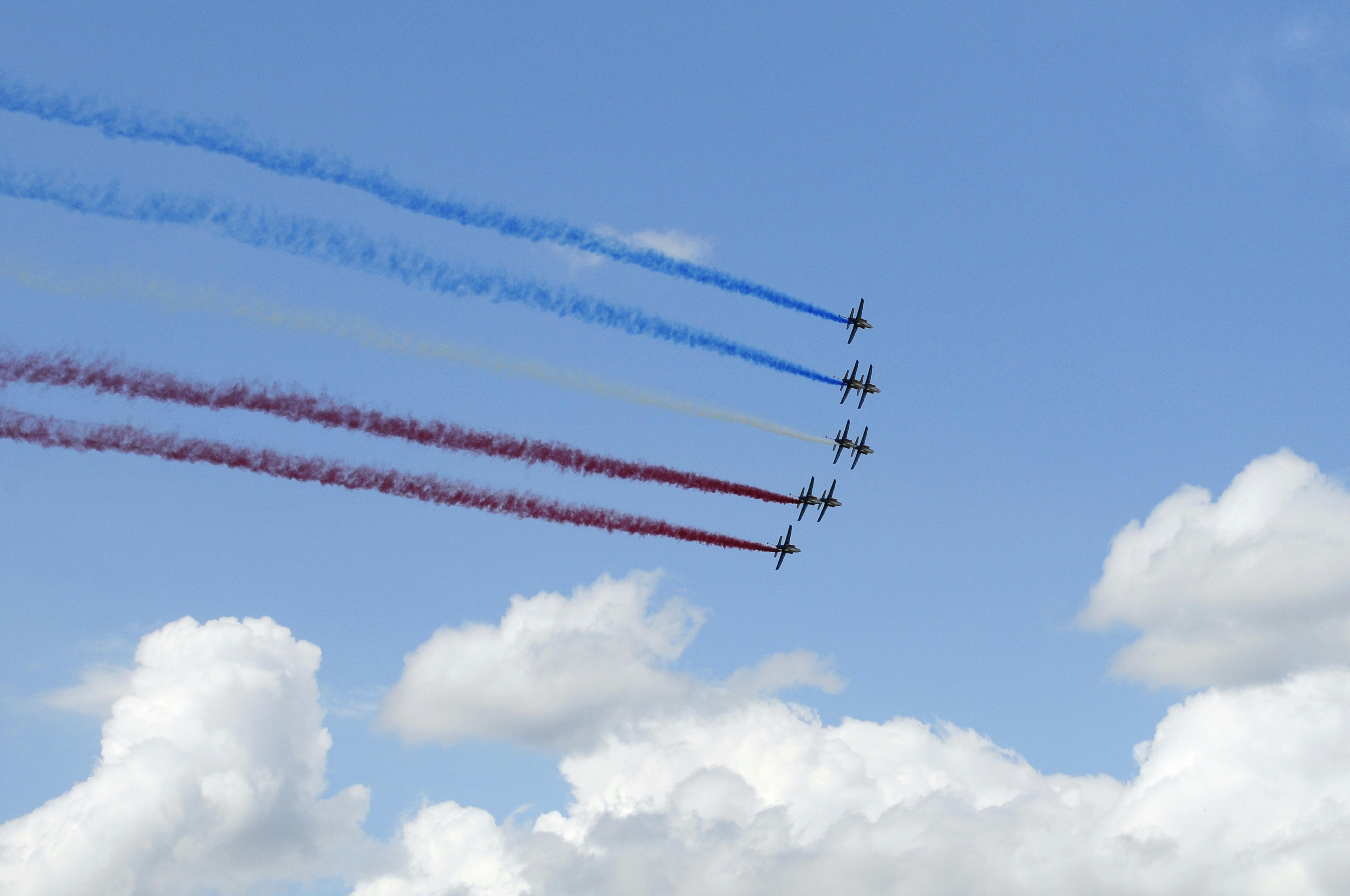 Jets let colored smoke in the style of France's 'tricolore' flag at the Paris Air Show. ID 9890337 &copy; Jasonjung | Dreamstime.com