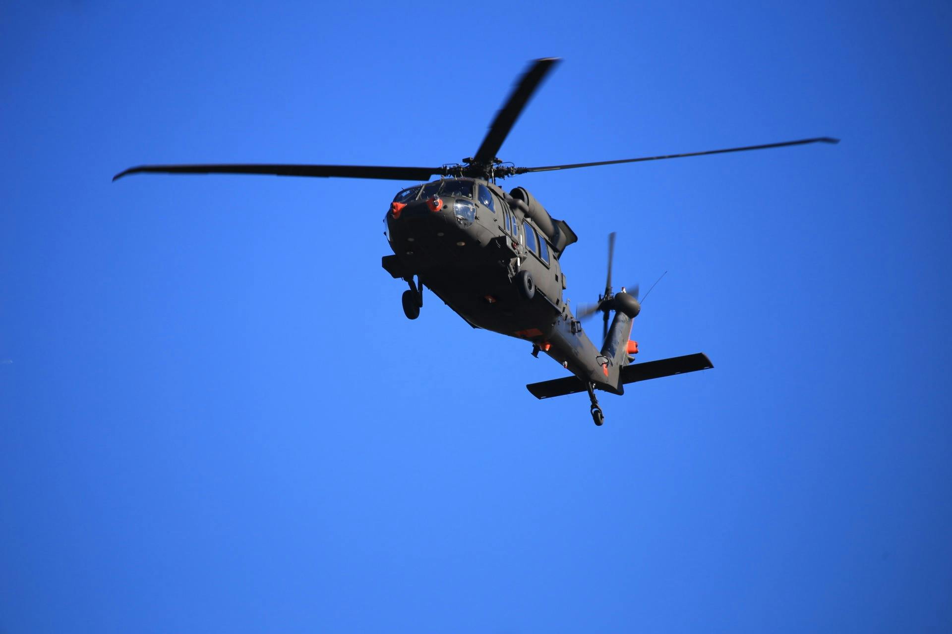 A UH-60M Army Helicopter conducting U.S. Army Phase I flight tests of Northrop Grumman&rsquo;s ITDS, featuring the ATHENA sensor. U.S. Army photo.