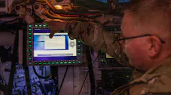 Lt. Col. David Hanna, Product Manager for Application Nexus for Key Resources (PdM ANKR) assigned to Capability Program Executive Command, Control, Communications, and Network (CPE C3N), demonstrates Spectre’s embedded training system on a Stryker during exercise Ivy Sting 4 at Fort Carson, Colo. U.S. Army photo by Spc. Jonathan Reyes.