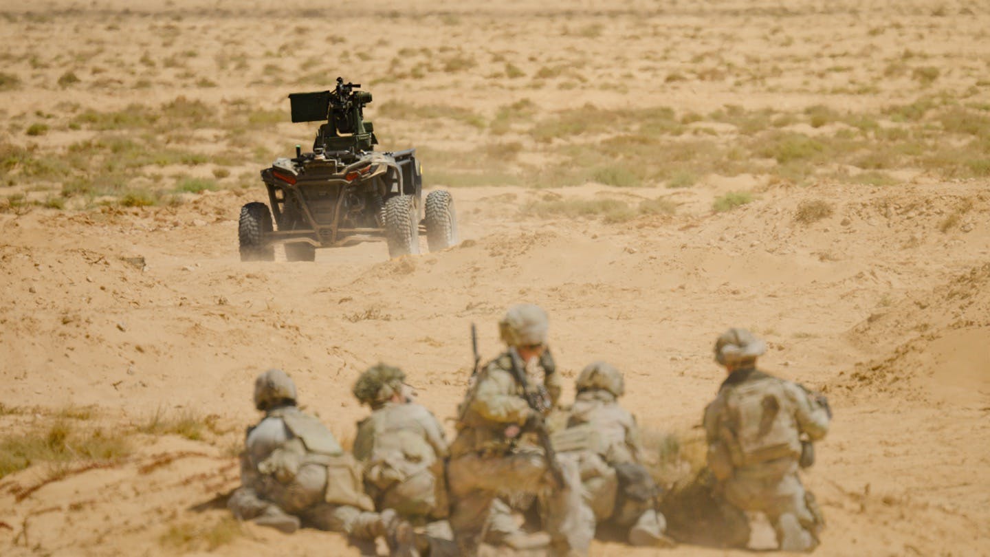 ULTRA autonomously maneuvers past forward line of troops to overwatch position. Overland AI photo.