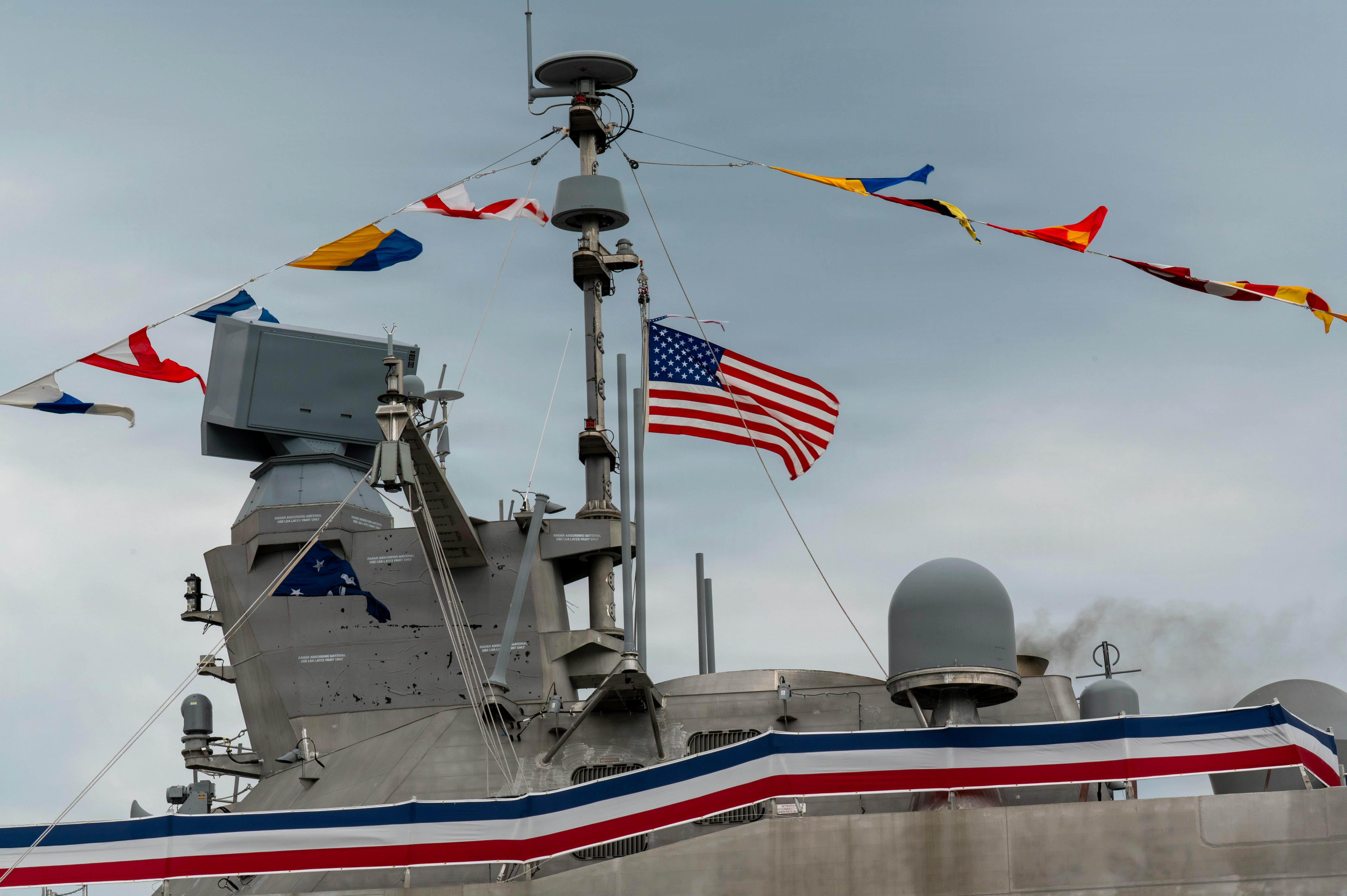 The engines are started, and the Secretary of the Navy flag is raised on the Freedom-variant littoral combat ship USS Cleveland (LCS 31) during the commissioning ceremony in Cleveland, Ohio, 16 May 2026. U.S. Navy photo by Mass Communication Specialist 1st Class Charlotte C. Oliver.