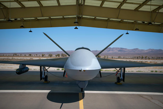 A General Atomics MQ-20 Avenger unmanned vehicle prepares for taxi at El Mirage Airfield, Calif. A recent test teamed the Avenger with an F-35 Lightning II to demonstrate crewed-uncrewed C2 and autonomy technology. U.S. Air Force photo by Staff Sgt. Tabatha Arellano.