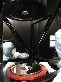 A 475mm diameter optical flat used as a reference surface to check the accuracy of the integration of the main mirrors in a satellite payload structure A 475mm diameter optical flat used as a reference surface to check the accuracy of the integration of the main mirrors in a satellite payload structure