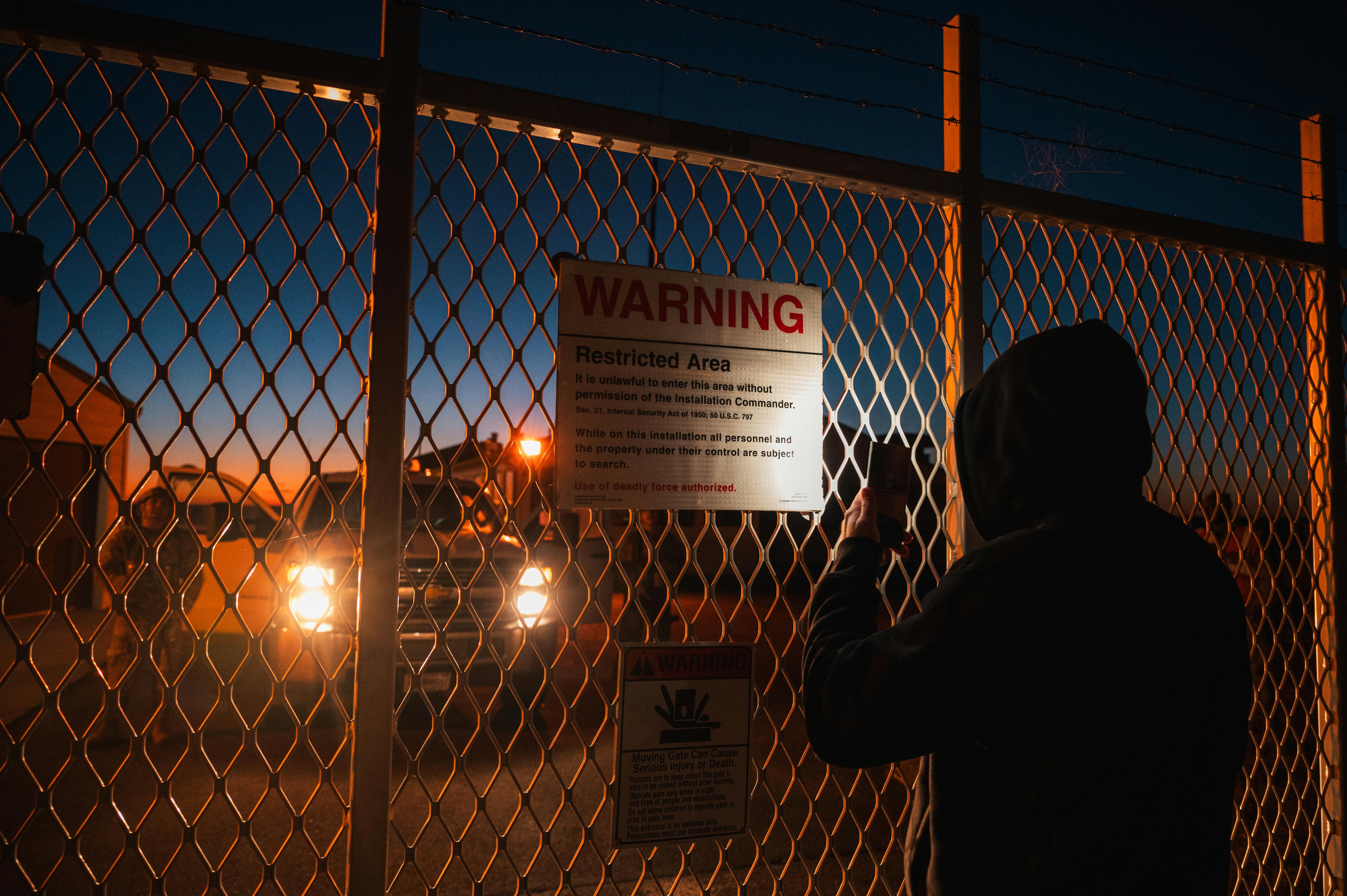 A defender in the 90th Security Forces Group poses as a protester during a 90th Missile Wing readiness exercise at Kilo-01 Missile Alert Facility near Dix, Neb. U.S. Air Force photo by Senior Airman Sarah Post
