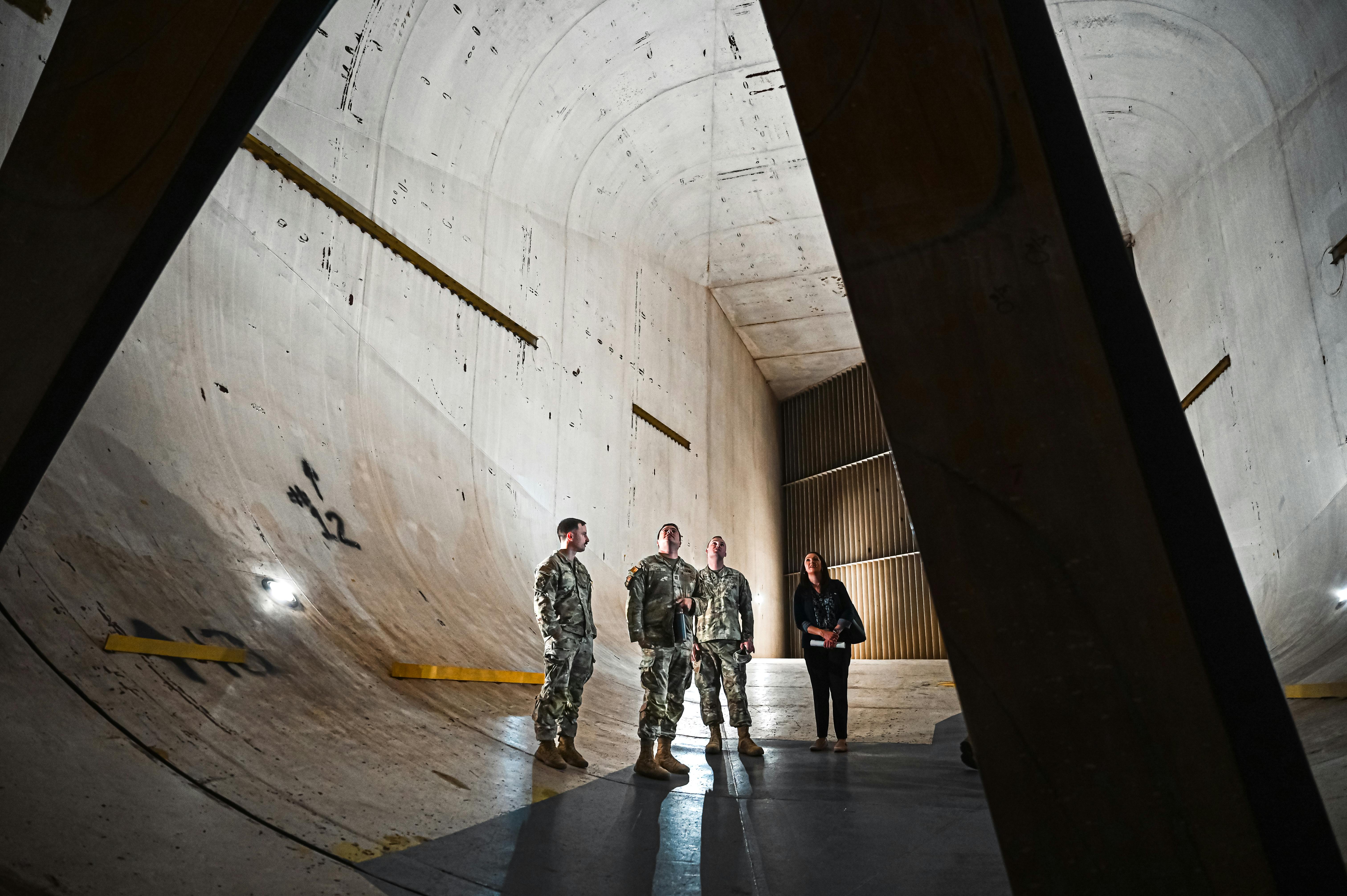 U.S. Airmen from Joint Base Langley-Eustis examine wind tunnel drive fans at NASA Langley Research Center, Va. Aerodynamicists use wind tunnels to test models of proposed aircraft. U.S. Air Force photo by Airman 1st Class Skylar Ellis.