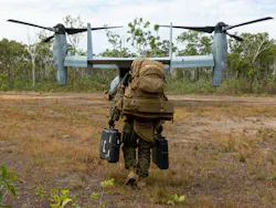 U.S. Marine Corps Staff Sgt. Robert Gerbec, a cybersecurity operations chief with Marine Rotational Force – Darwin 25.3, prepares to board an MV-22B Osprey assigned to Marine Medium Tiltrotor Squadron (VMM) 363, MRF-D 25.3 during an integration check. The integration check ensures that the MRF-D Marine Air-Ground Task Force is prepared to conduct crisis-response operations. U.S. Marine Corps photo by Sgt. Ezekieljay Correa.