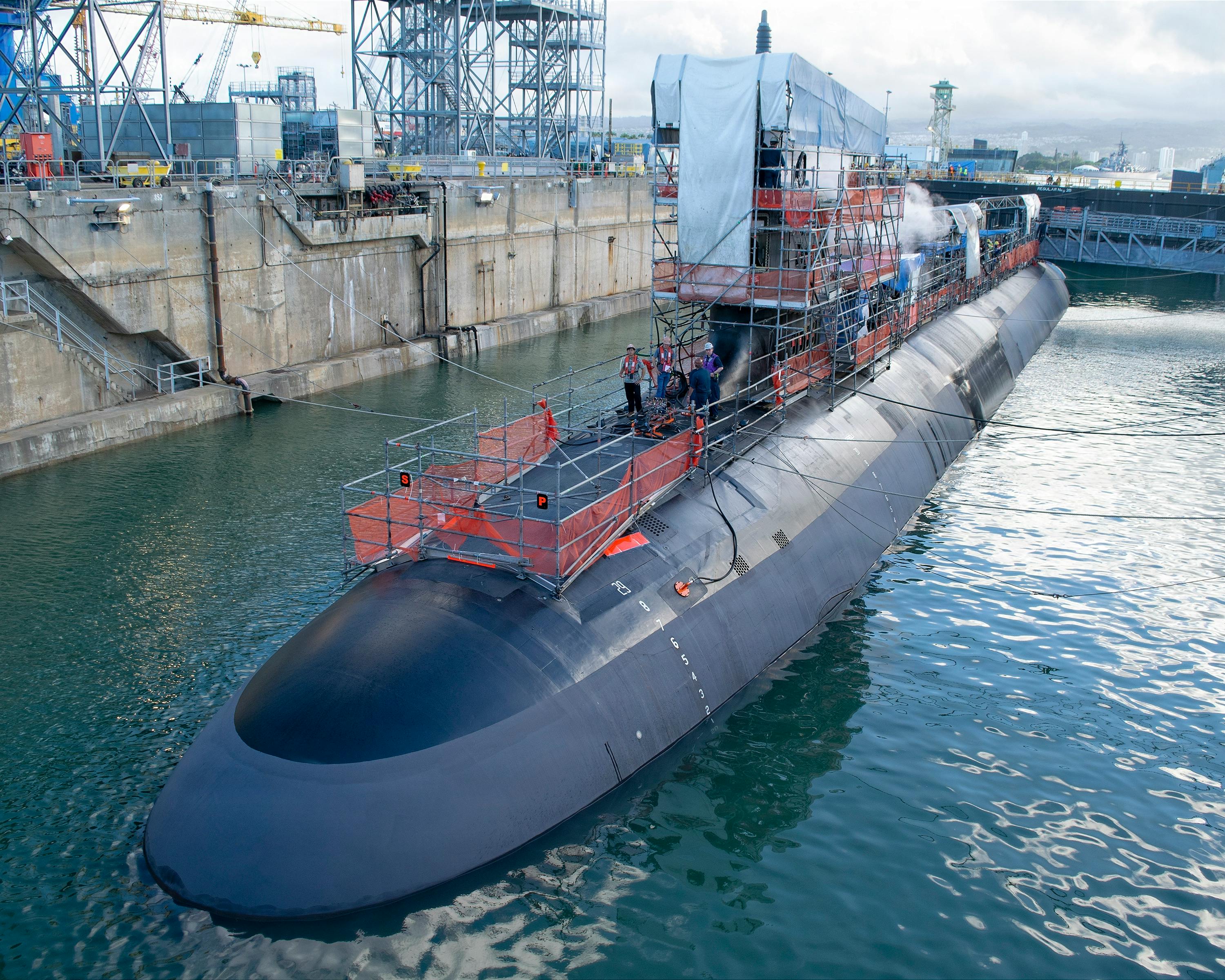 Virginia-class fast-attack submarine USS Illinois (SSN 786) sits in a partially flooded Dry Dock 2 as it prepares to undock at Pearl Harbor Naval Shipyard and Intermediate Maintenance Facility (PHNSY & IMF). U.S. Navy photo by Mike Wilson.
