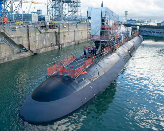 Virginia-class fast-attack submarine USS Illinois (SSN 786) sits in a partially flooded Dry Dock 2 as it prepares to undock at Pearl Harbor Naval Shipyard and Intermediate Maintenance Facility (PHNSY & IMF). U.S. Navy photo by Mike Wilson.
