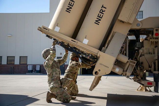 U.S. Army soldiers assigned to Bravo Battery, 2nd Air Defense Artillery Regiment, 11th Air Defense Artillery Brigade, 32nd Army Air and Missile Defense Command demonstrate how they prepare the Terminal High Altitude Area Defense missile defense system. U.S. Army photo by Spc. David Poleski.