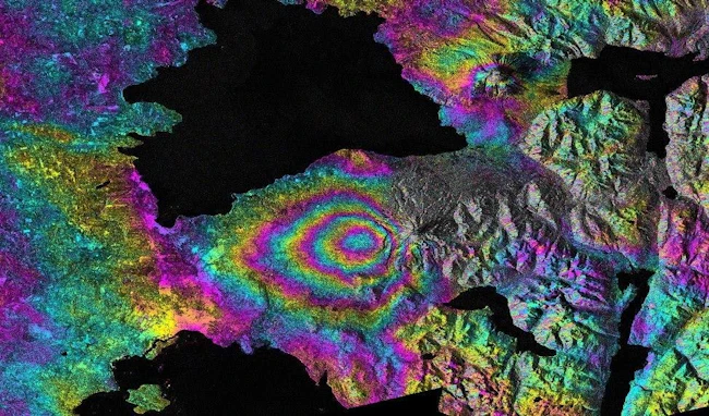 Synthetic aperture radar (SAR) refers to a technique for producing fine-resolution images from a resolution-limited radar system. It requires that the radar be moving in a straight line, either on an airplane or, as in the case of NISAR, orbiting in space. NASA image.