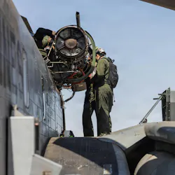 U.S. Marines with Heavy Marine Helicopter Squadron 462 (HMH-462), Marine Aircraft Group 16, 3rd Marine Aircraft Wing, conduct repairs on a CH-53 Super Stallion engine at the Strategic Expeditionary Landing Field, Marine Corps Air Ground Combat Center, Twentynine Palms, Calif. U.S. Marine Corps photo by Lance Cpl. Lainey Brummett.