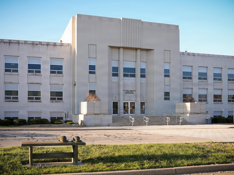 The sun rises over the Air Force Research Laboratory headquarters building at Wright-Patterson Air Force Base, Ohio. AFRL is the primary scientific research and development center for the Department of the Air Force, leading the discovery, development, and integration of warfighting technologies for air, space, and cyberspace forces. U.S. Air Force photo by Matthew Clouse.