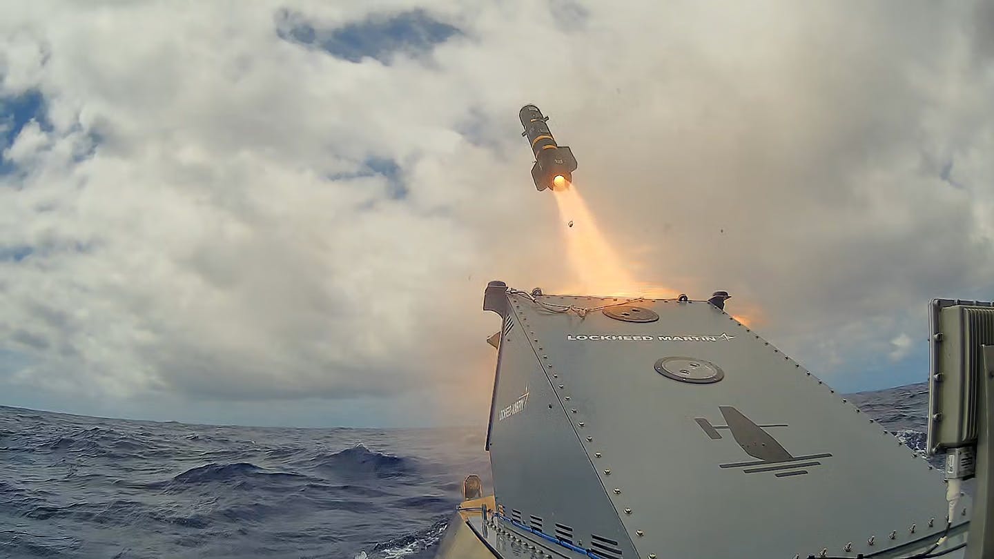 A missile is shown launching from the Saildrone platform