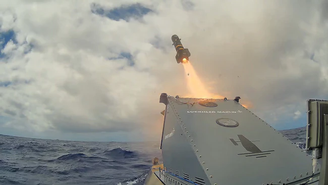 A missile is shown launching from the Saildrone platform