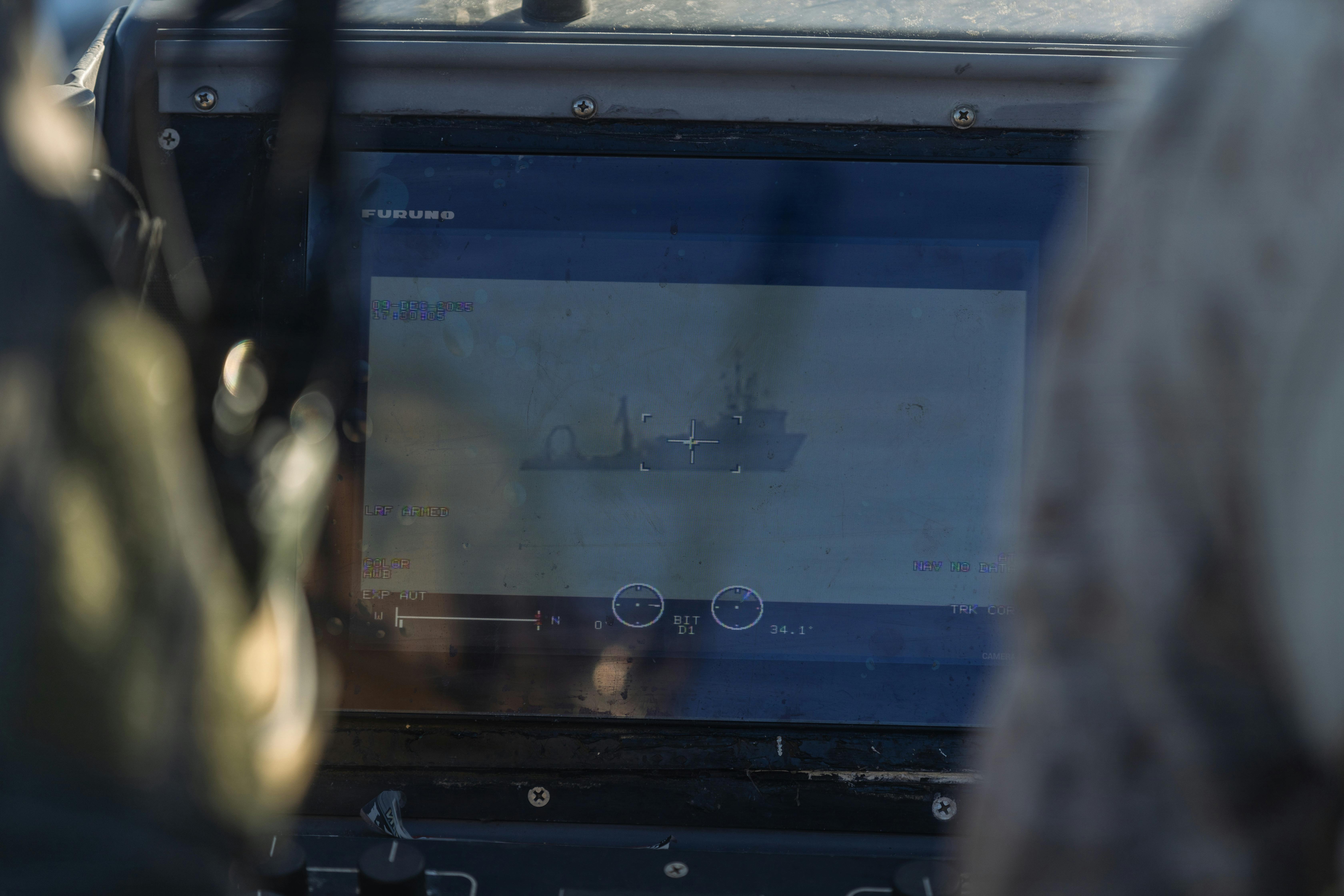 U.S. Marines with Maritime Reconnaissance Platoon, 1st Reconnaissance Battalion, 1st Marine Division, observe a vessel while conducting maritime domain awareness during Exercise Steel Knight 25 at San Clemente Island, Calif. USMC photo by Lance Cpl. Alan Gomez.