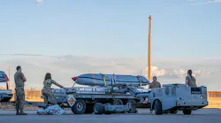 U.S. Airmen assigned to the 7th Munitions Squadron use an MHU-830 Lift Truck to transport a Joint Air-to-Surface Standoff Missile at Dyess Air Force Base, Texas. U.S. Air Force photo by Airman 1st Class Caleb Schellenberg.