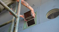 U.S. Air Force Tech. Sgt. Alexis Areizaga-Irizarry, an avionics technician with the 165th Maintenance Squadron, Georgia Air National Guard, practices loading countermeasures on a C-130J Hercules aircraft while attending the Weapon Task Qualification Manager/Munitions Training Course at Naval Air Station Joint Reserve Base Fort Worth, Texas, August 7, 2024. The WTQM course, taught by the Advanced Airlift Tactics Training Center, based in St. Joseph, Missouri, includes training in the uploading of expendables in the ALE-47 Chaff and Flare Systems. U.S. Air National Guard photo by Master Sgt. Patrick Evenson.