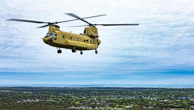 A CH-47F Chinook helicopter from the Connecticut Army National Guard flies over Nantucket, Mass. The CH-47F Chinook helicopter features a Common Avionics Architecture System (CAAS) cockpit. U.S. Army photo by Sgt. Matthew Lucibello.