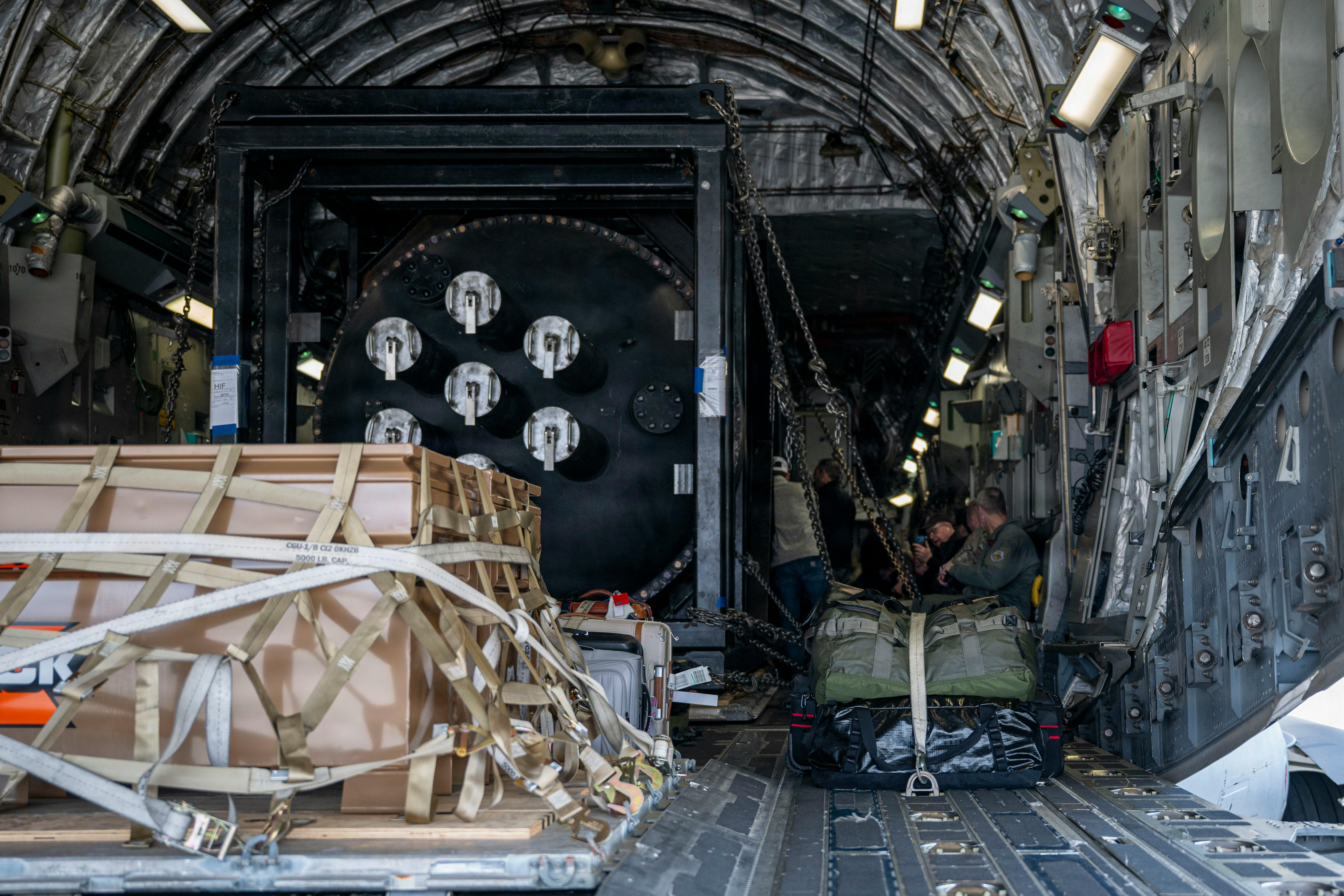 U.S. Air Force Airmen assigned to the 452nd Logistics Readiness Squadron Aerial Port Flight at March Air Reserve Base, California, support loading operations of a next-generation nuclear reactor onto a C-17 Globemaster III. U.S. Air Force photo by Technical Sergeant Kekoa Santiago.