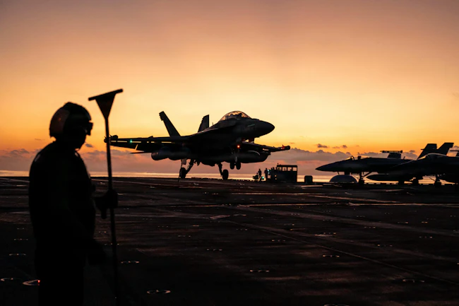 An EA-18G Growler, attached to Electronics Attack Squadron (VAQ) 141, lands on the flight deck of Nimitz-class aircraft carrier USS George Washington (CVN 73) while underway in the Philippine Sea. U.S. Navy photo by Mass Communication Specialist 3rd Class Juan Cordova.