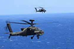 Two U.S. Army AH-64 Apaches from the 16th Combat Aviation Brigade, 7th Infantry Division (Multi-Domain Command - Pacific) fire spike missiles during a sinking exercise as part of Exercise Rim of the Pacific 2026. U.S. Army photo by Staff Sgt. Christian Morton.