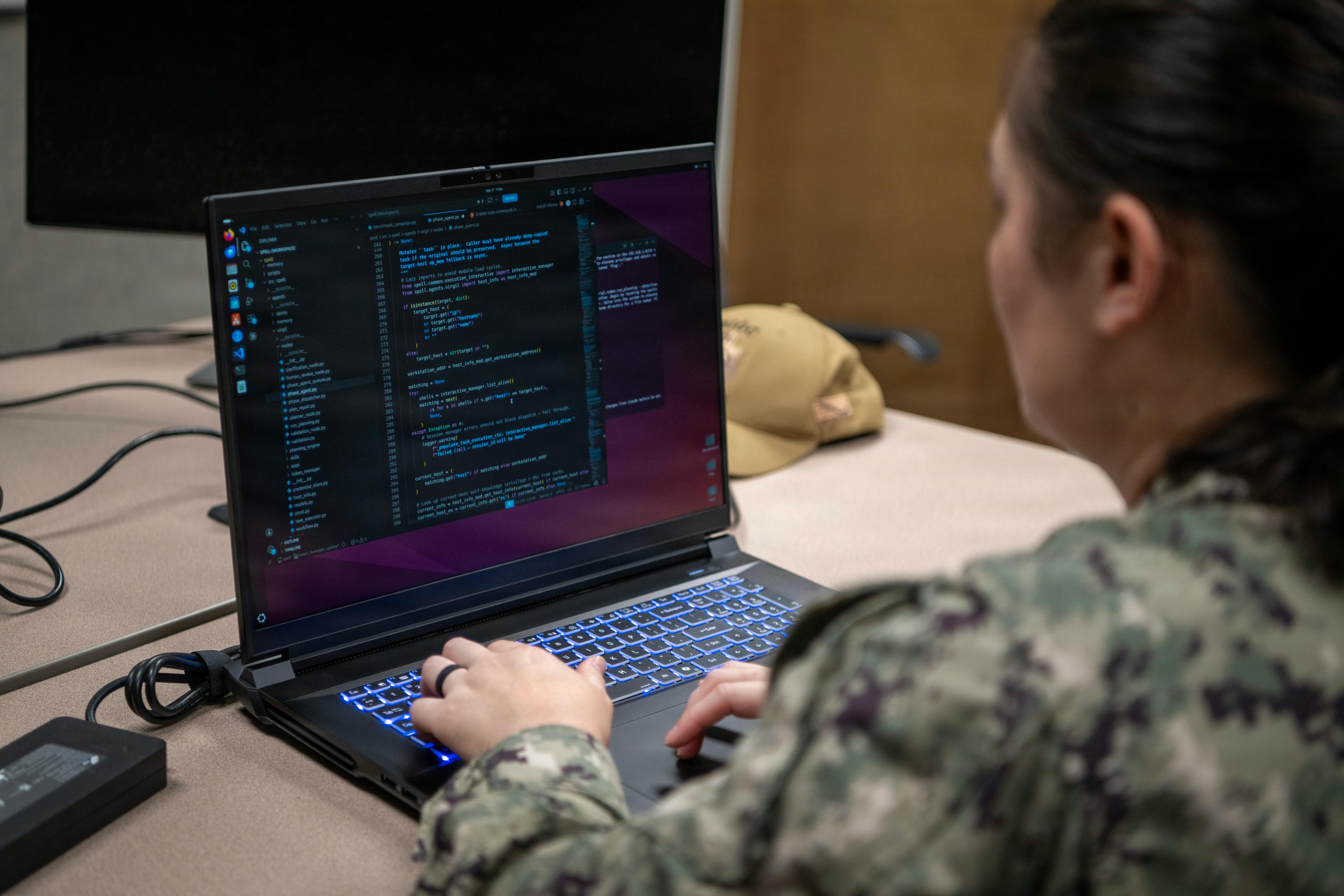 U.S. Navy Lt. Kristina Bodeman reviews coding used in her thesis research at the Naval Postgraduate School in Monterey, Calif. U.S. Navy photo by Mass Communication Specialist 2nd Class Janiel Adames.